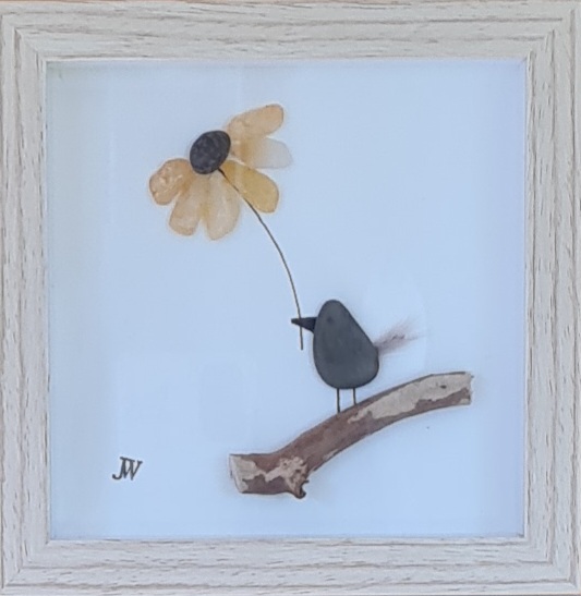 Blume im Schnabel links